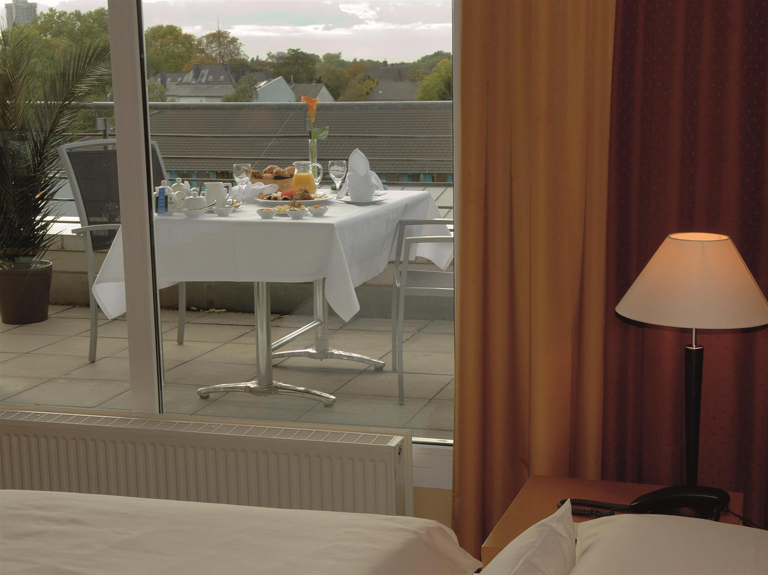 Hotel Plaza Premium Koeln Pokoj fotografie